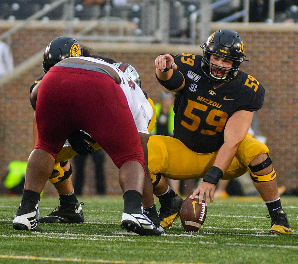 Missouri center Case Cook points out the defense